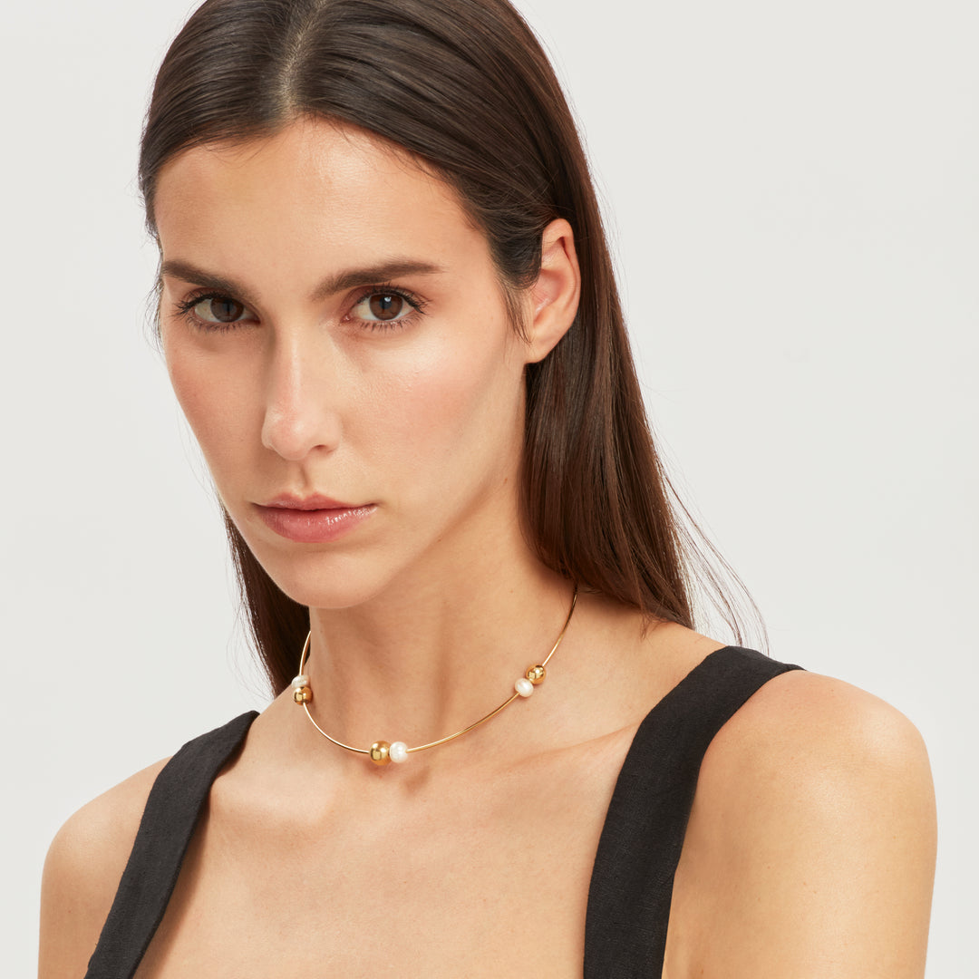 Collier Breil rigide Bubble en acier finition or IP et perles TJ3777