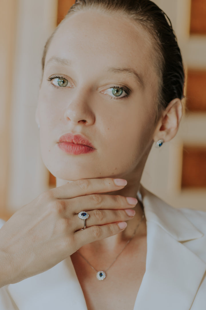 Bague Comete en or avec diamants et saphir bleu ovale ANB2621