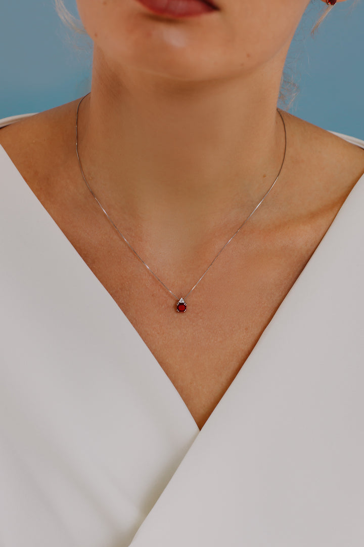 Comete Girocollo in Oro Diamante e Rubino tondo GLB1502