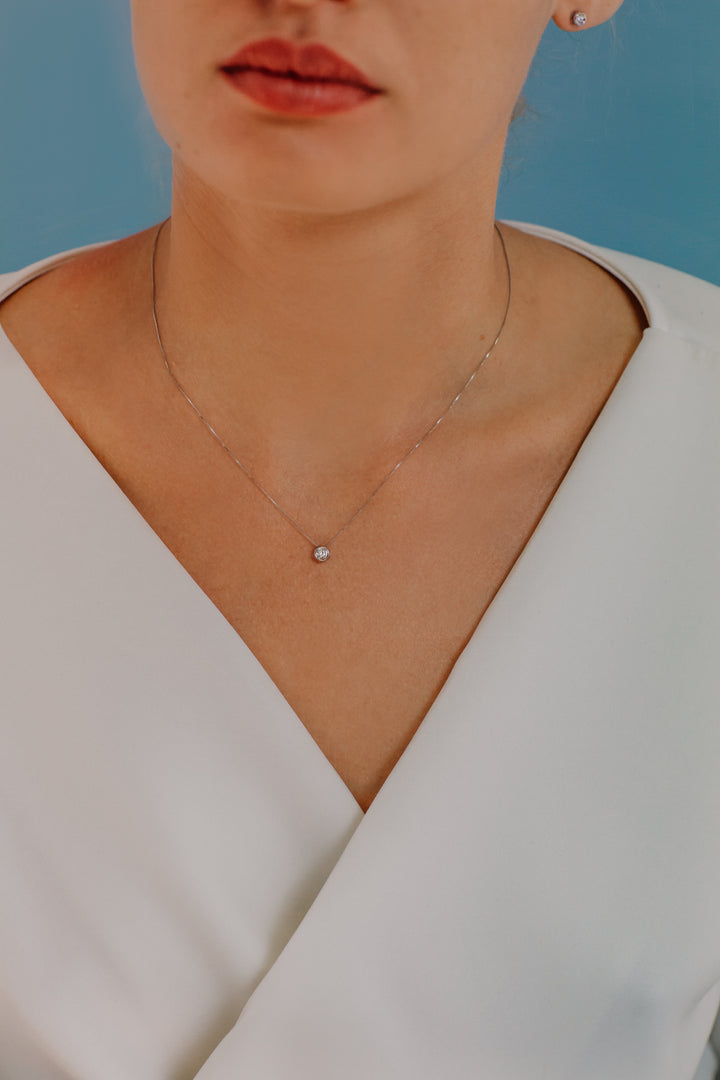 Comete Collana Punto luce tondo in Oro e Diamante GLB1423