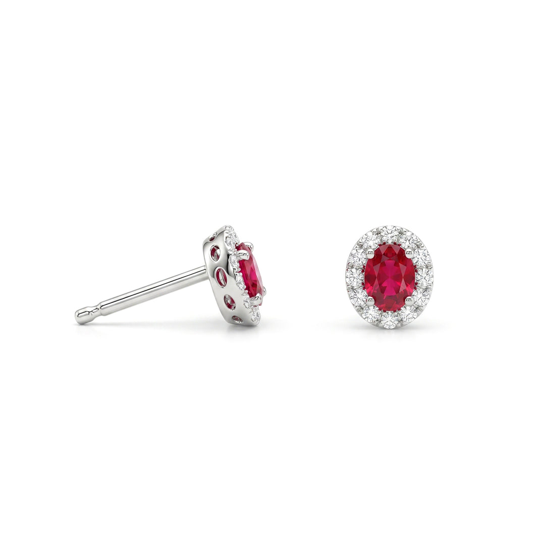 Nihama or 18k 4x3 oval ruby with diamond surround NO5183O4RBC