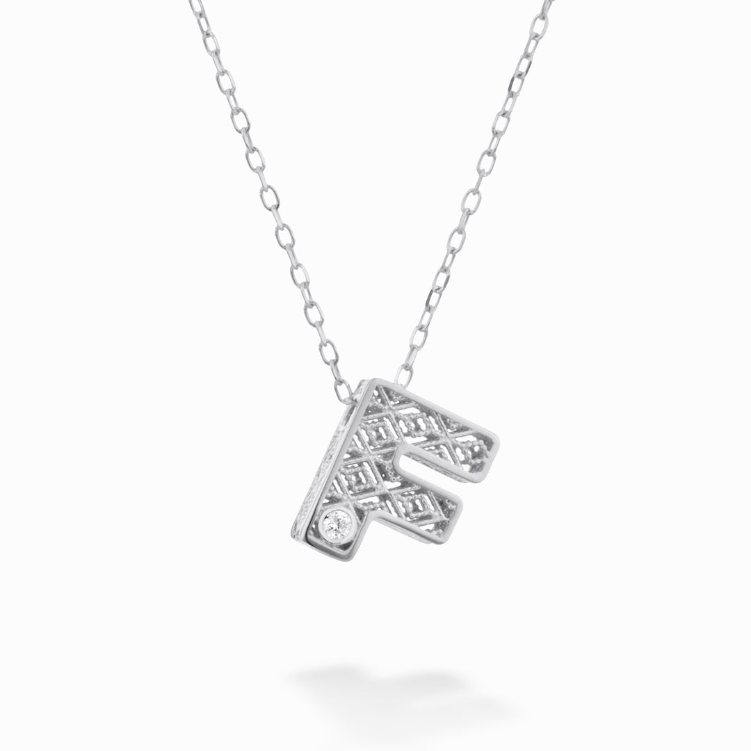 Nihama cl 18k letra f oro blanco diam. ct.0,01 NDLETFO4