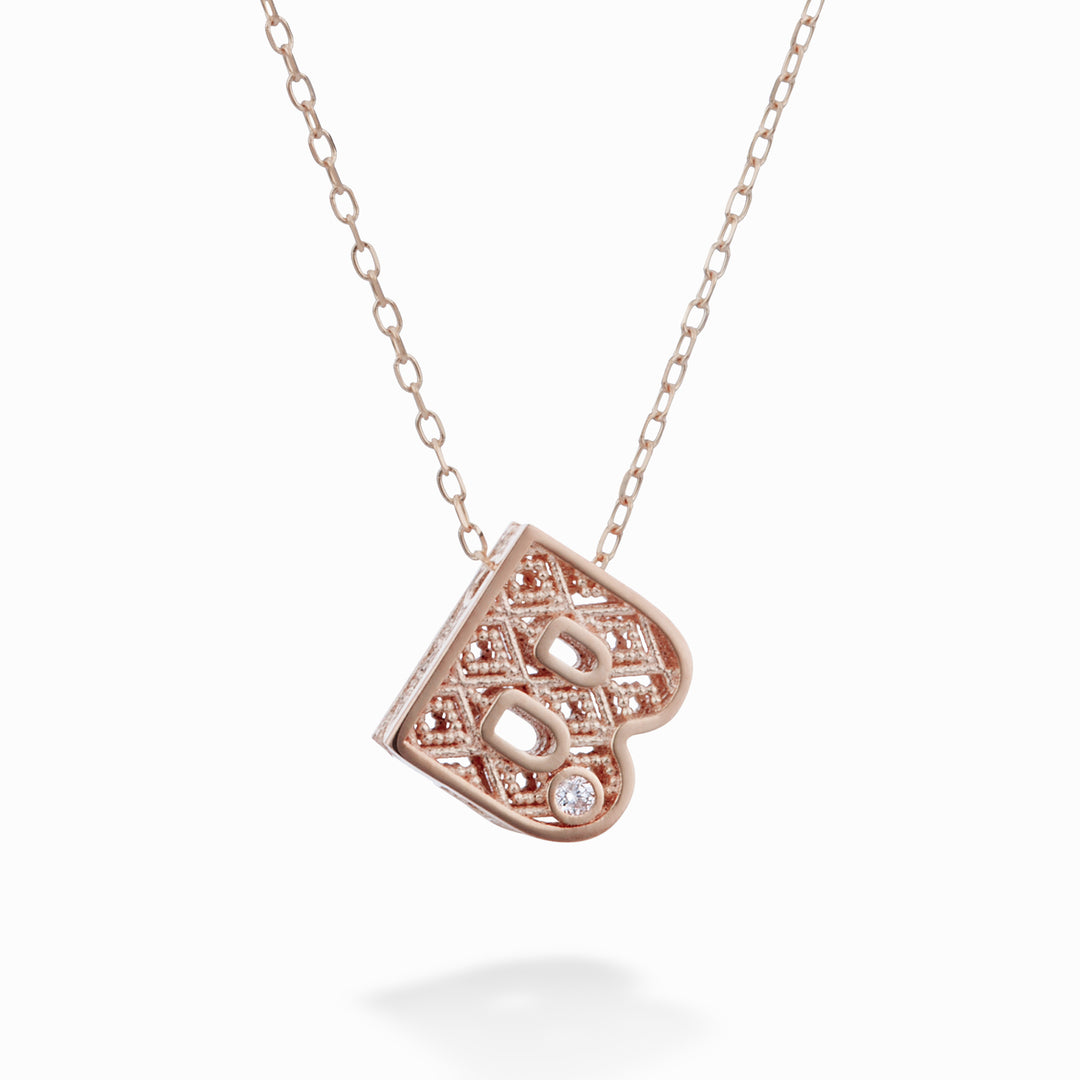 Mikiko cl 18k lettre b or rose diam. ct.0,01 MDLETBO3