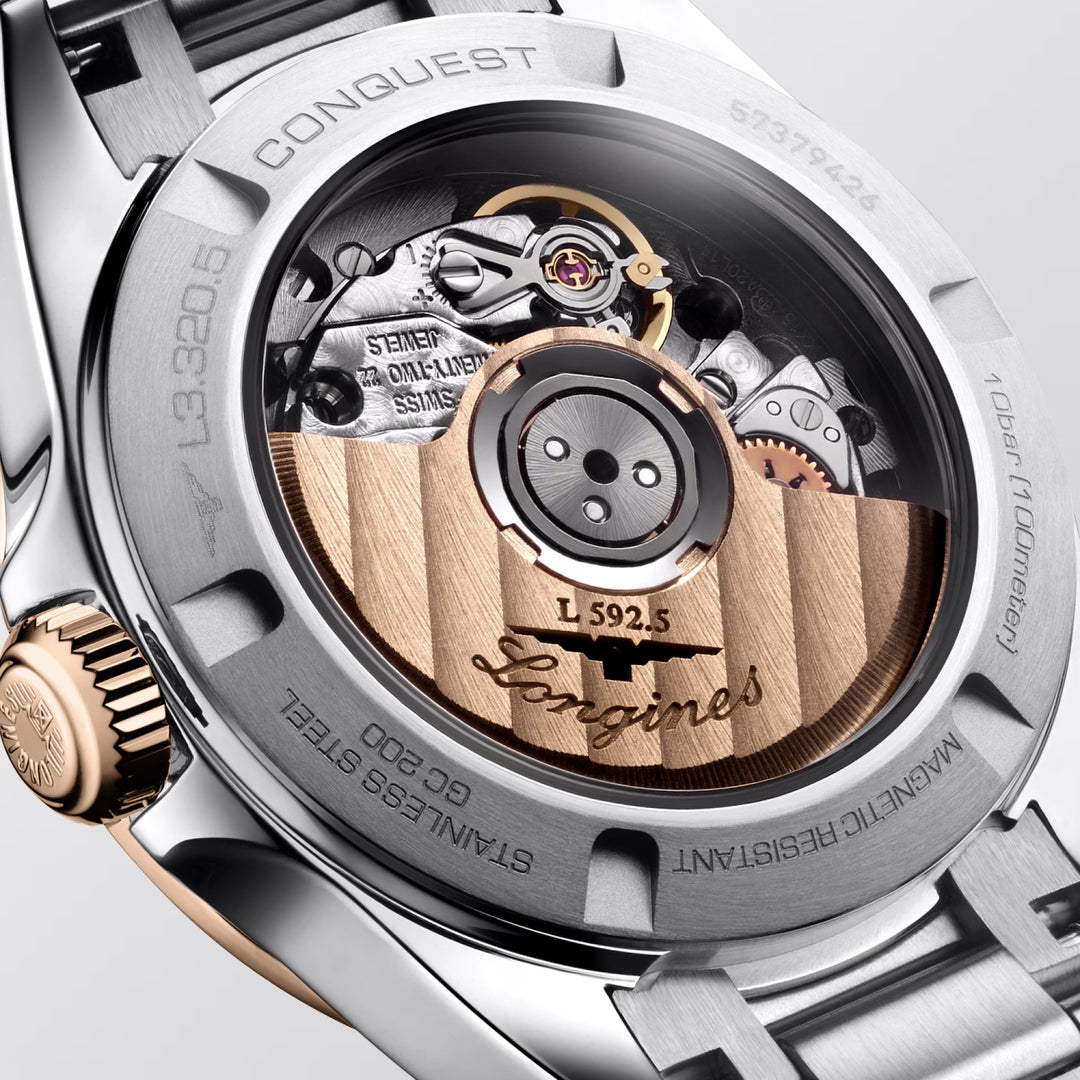 Montre Longines Conquest 30mm bleu automatique acier finition PVD or rose L3.320.5.92.6