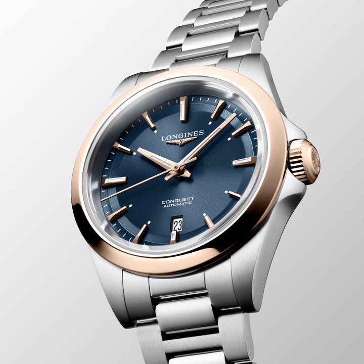 Montre Longines Conquest 30mm bleu automatique acier finition PVD or rose L3.320.5.92.6