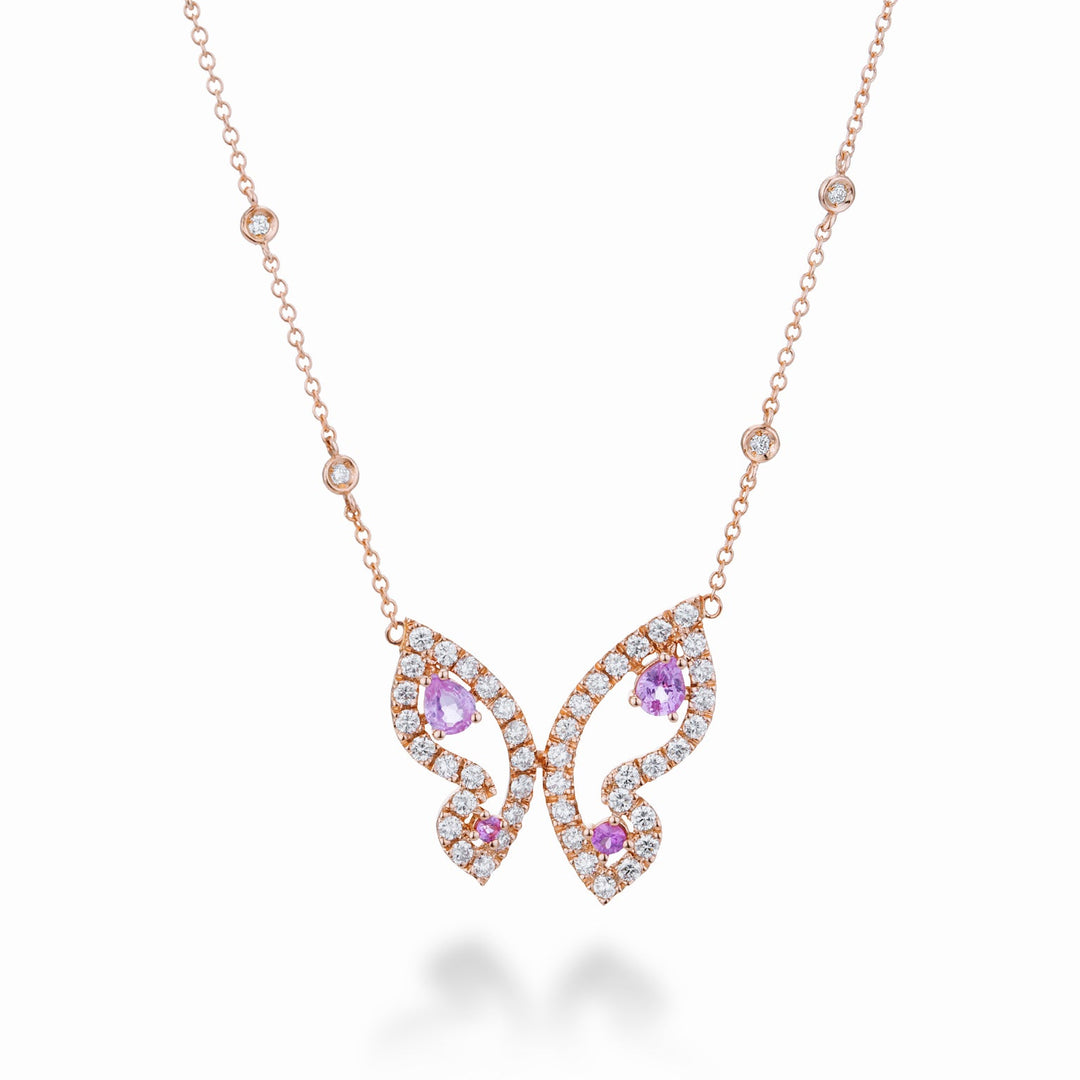 Kleine vlinderhanger met saffieren roze en diamanten